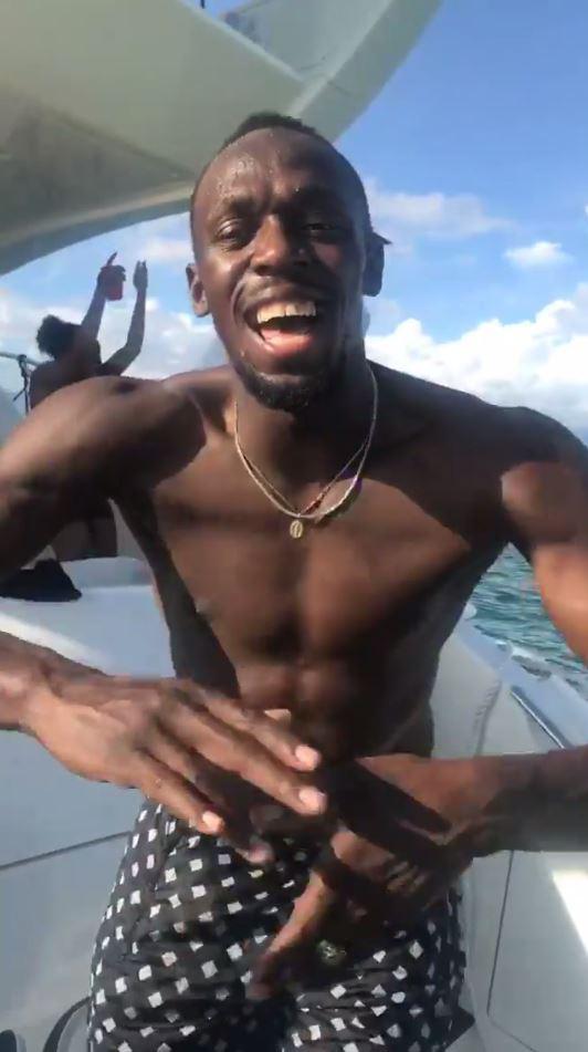  Usain Bolt was filmed celebrating his retirement, partying on board a yacht with friends