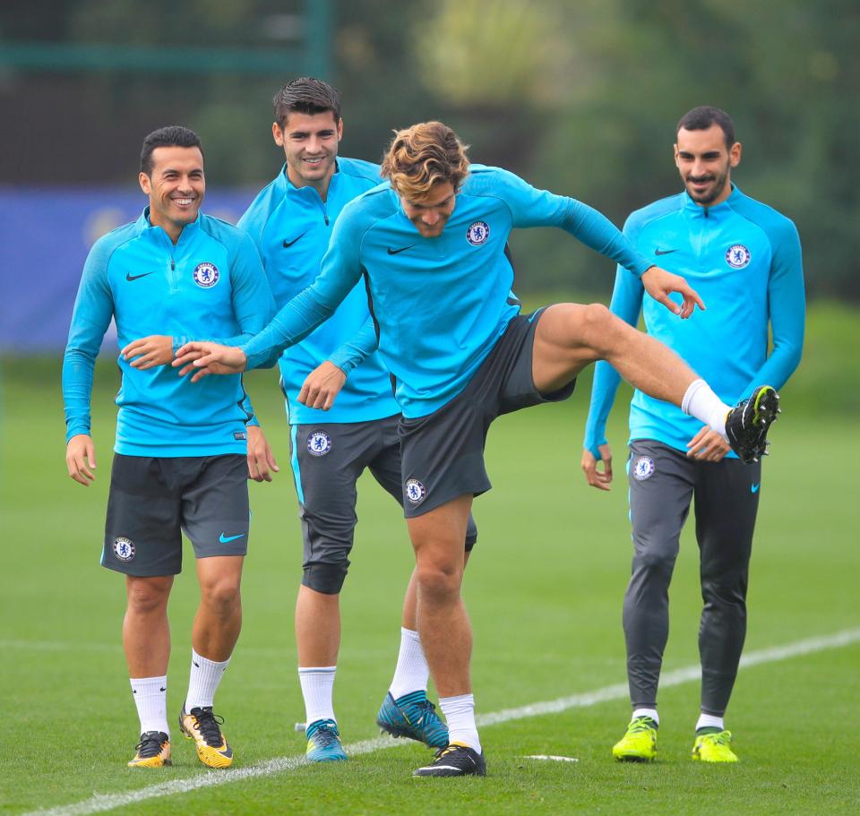 Marcos Alonso looked in good spirits during Tuesday's training session ahead of Atletico Madrid showdown