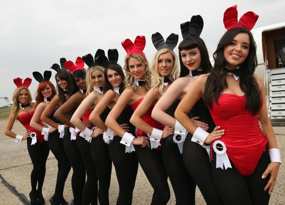  Playboy Bunnies line up on the tarmac at Stansted to greet Hugh Hefner, in 2011