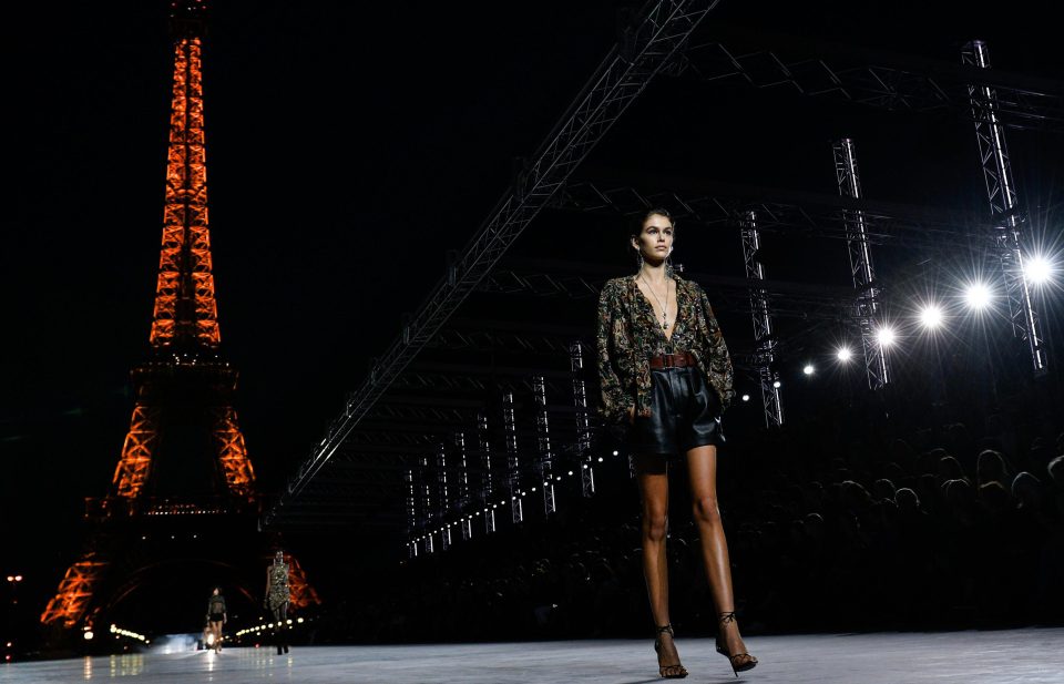  The show was held at the base of the stunning Eiffel Tower at night