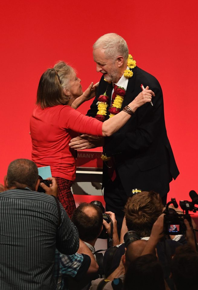  Mr Corbyn was presented with a floral necklace as he concluded his address