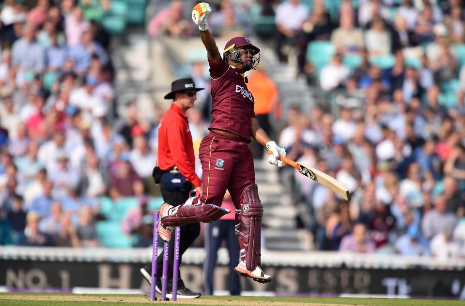 The moment Lewis moved to his second ODI century for the Windies