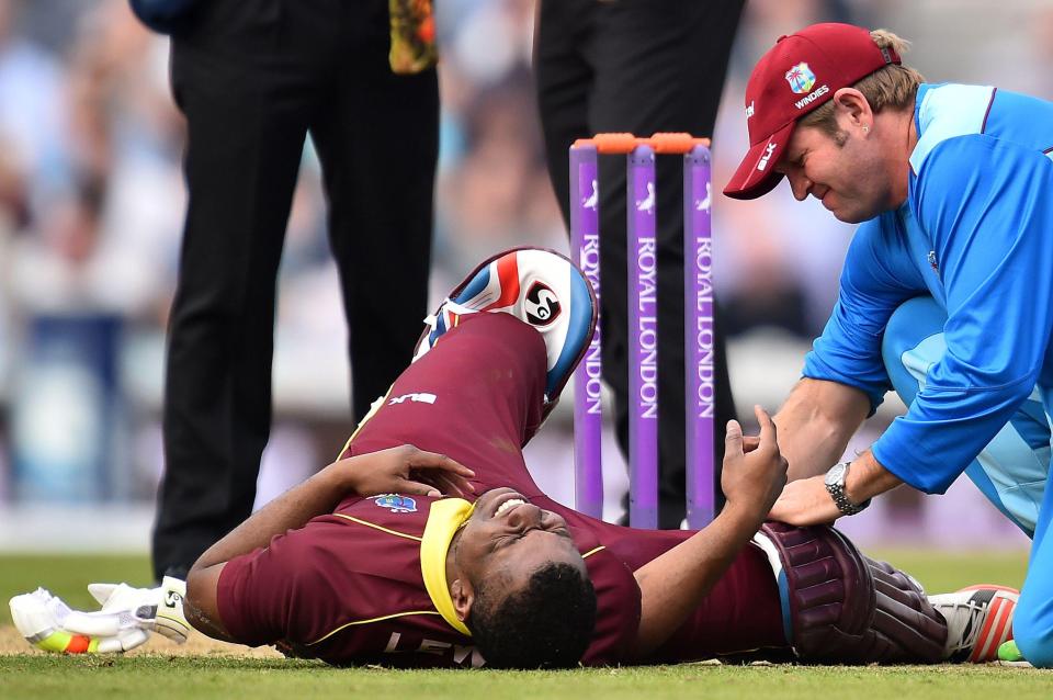  Evin Lewis was left floored after smashing a ball into his foot