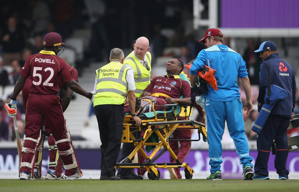 Trinidadian batsman Lewis was forced to leave the field on a stretcher