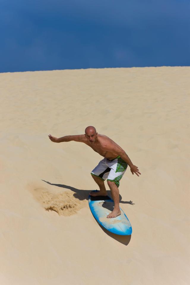  Explore Abu Dhabi with Celebrity and see stunning sand dunes and sandboarding