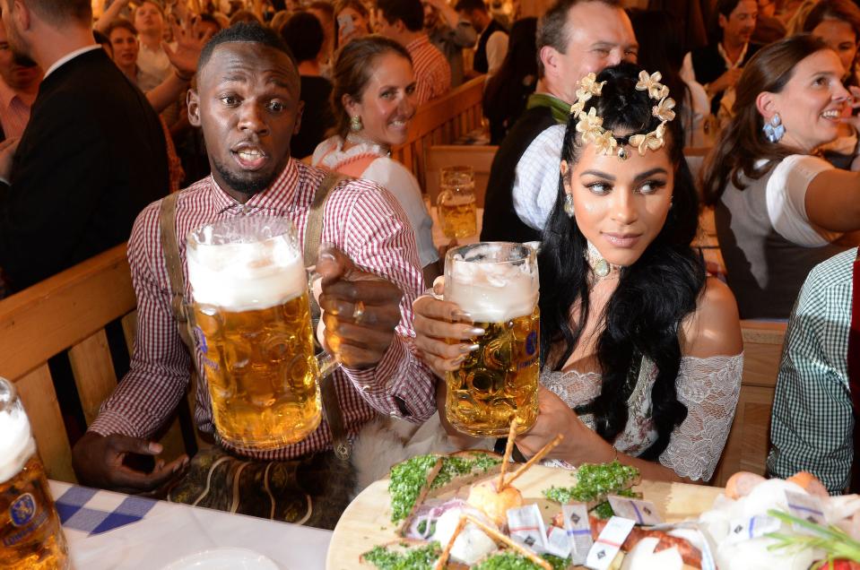 Usain Bolt is continuing his post-retirement party alongside girlfriend Kasi Bennett at Oktoberfest