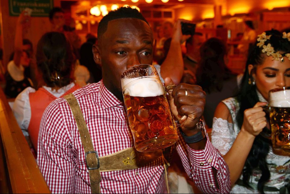 The Jamaican legend was having the time of his life downing steins