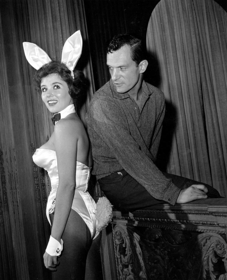 layboy magazine publisher Hugh Hefner poses with "bunny-girl" hostess Bonnie J. Halpin at Hefner's nightclub in Chicago in 1961