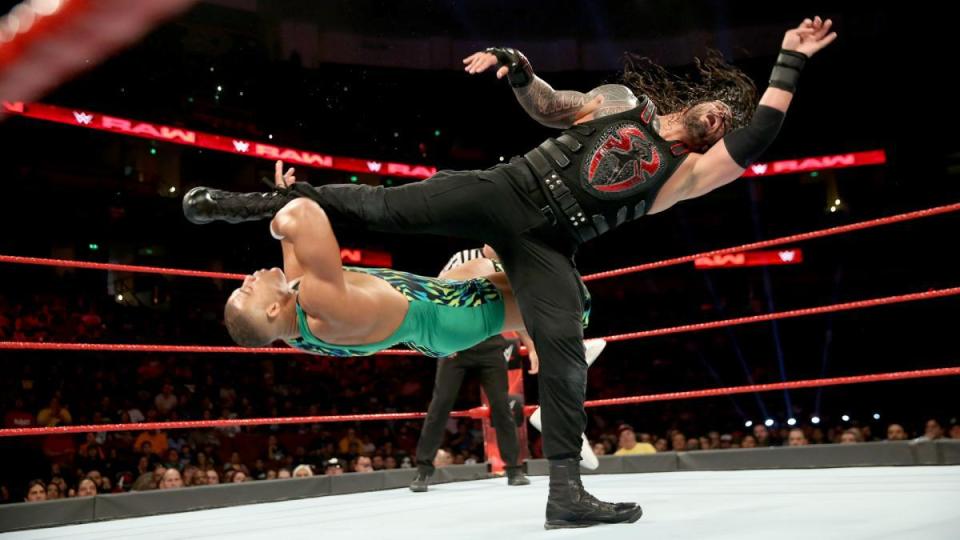  Roman reigns levels Jason Jordan with a big boot