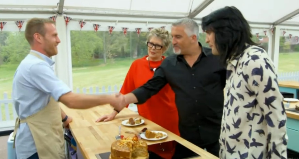  Paul Hollywood shakes one of three hands on last night's episode