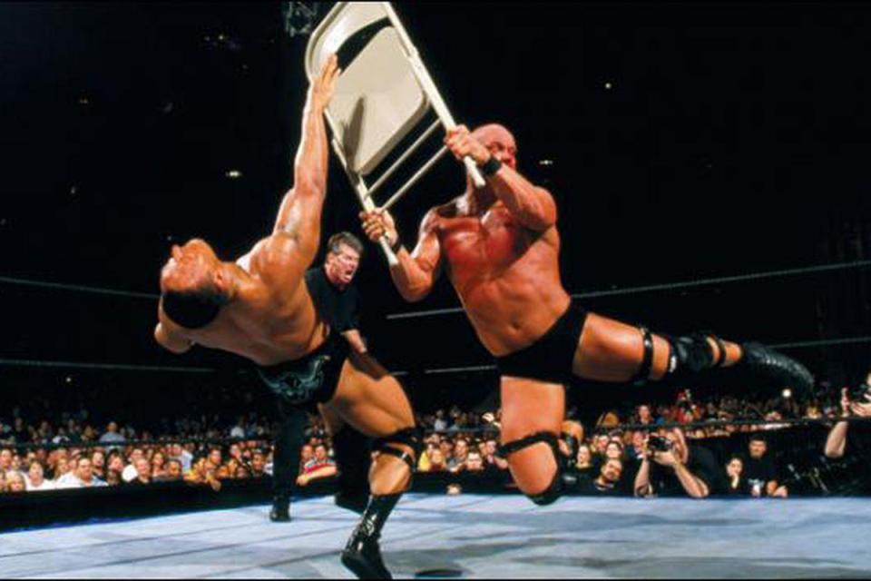  Stone Cold hits a hard chair on Rock