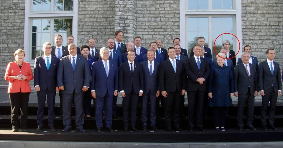  Theresa May was pushed to the back of the pack in the EU’s family photo - the PM, circled, looked isolated in the group of leaders in Estonia