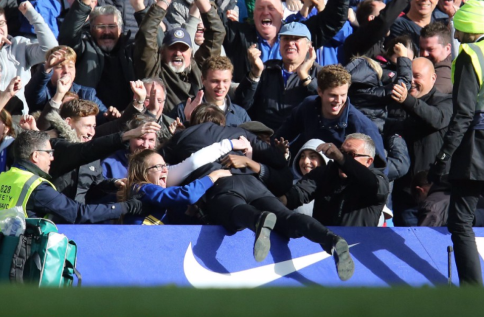  Antonio Conte dives into the crowd after Chelsea score