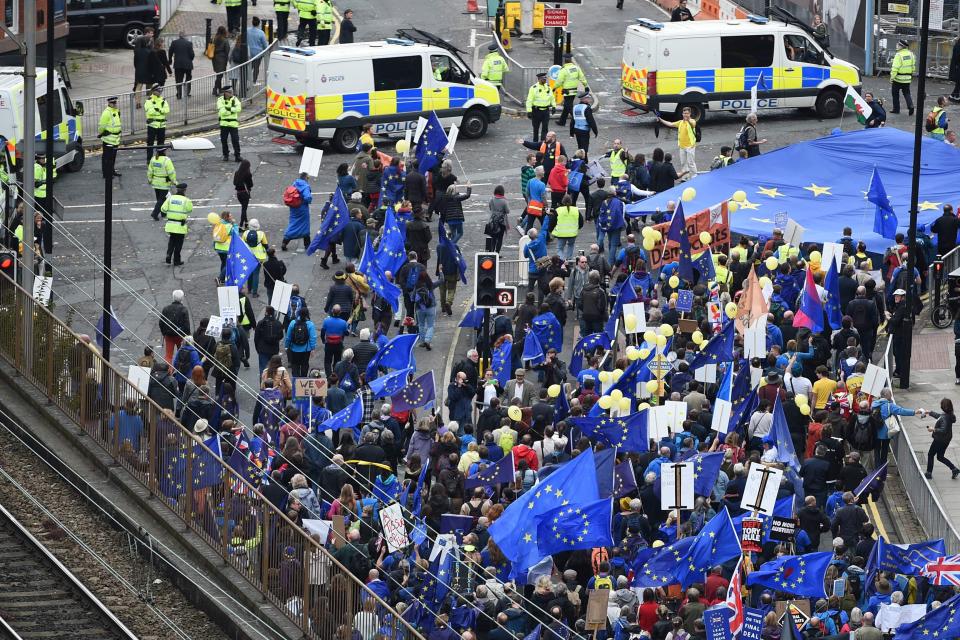  Thousands showed up to protest against Brexit too and waved EU flags across Manchester