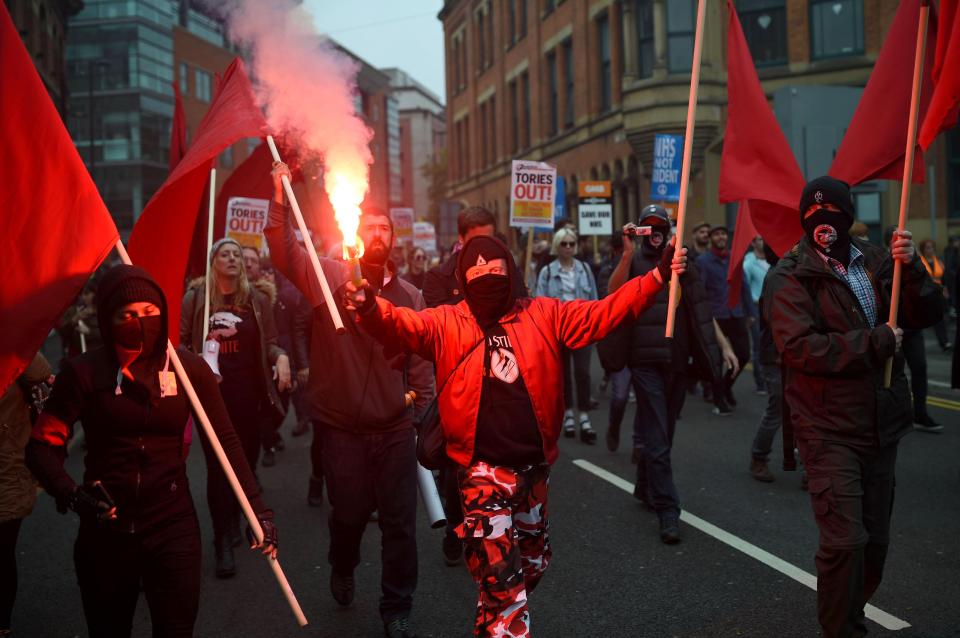  Hard-left protestors held flares and chanted as they marched through the city today