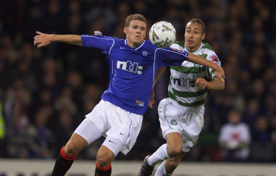  Malcolm in action with former Celtic ace Henrik Larsson