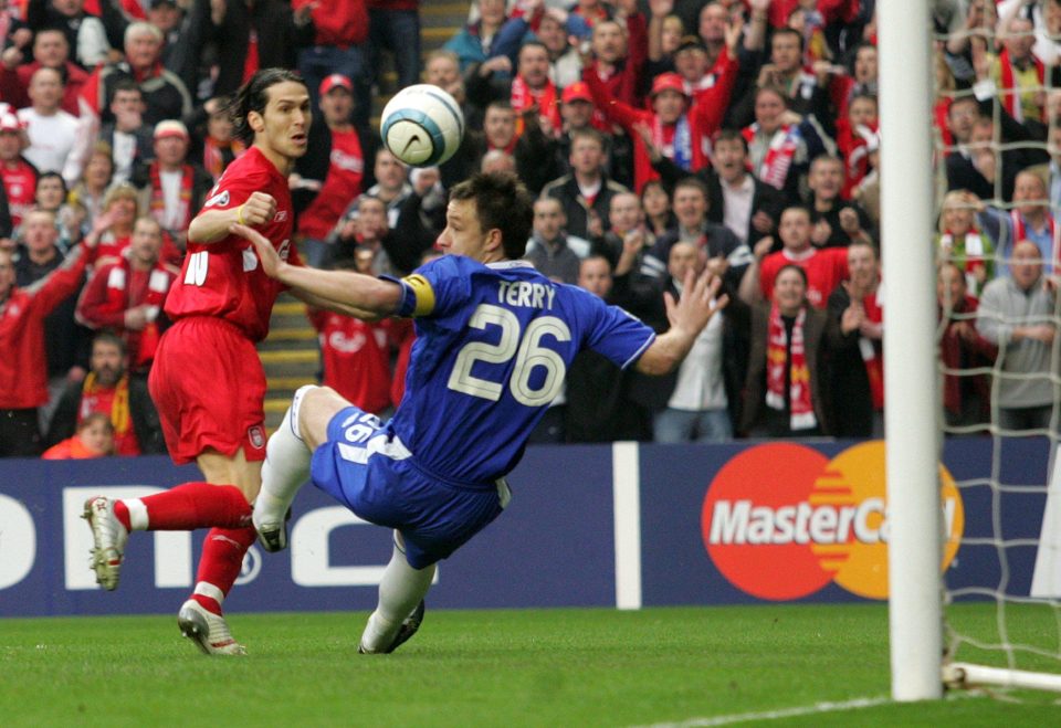  Luis Garcia lifts the ball over John Terry in the Champions League semi-final