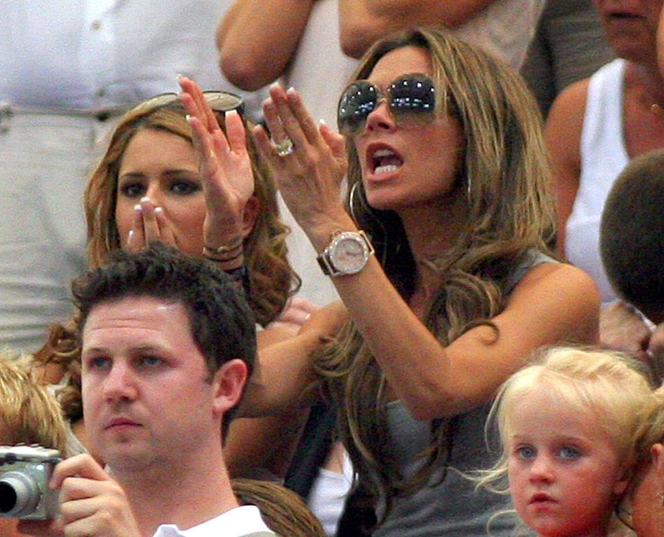  Cheryl and Victoria Beckham during a particularly tense moment of the the 2006 campaign