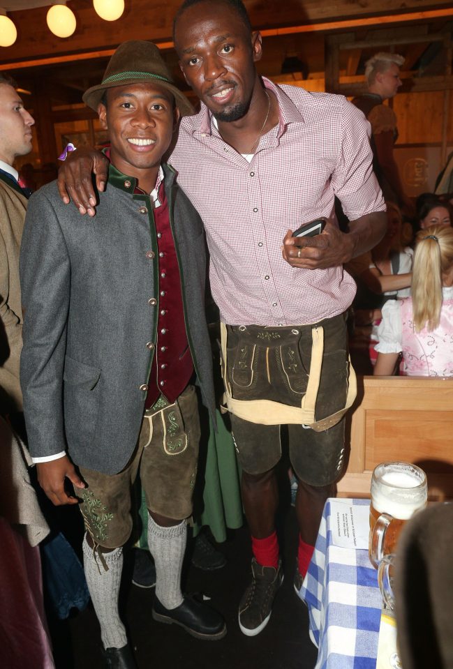 Bolt has spent the summer relaxing and enjoying his new found freedom, he is pictured enjoying Oktoberfest with David Alaba of FC Bayern