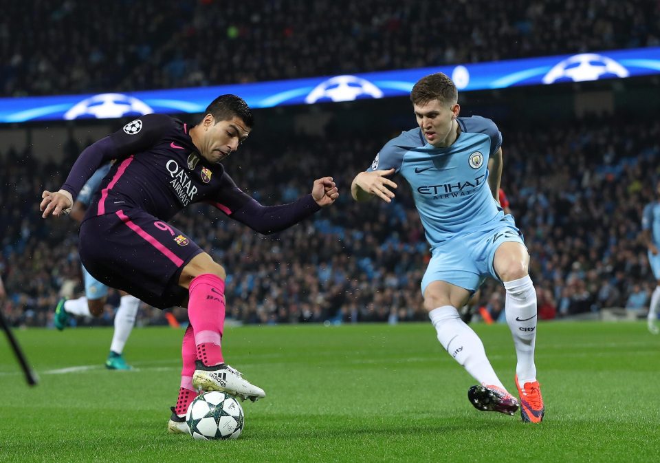  John Stones was given a tough time against Barcelona last season