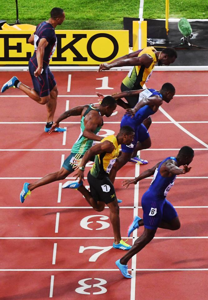 Jason Gatlin dips over the line ahead of Christian Coleman and Usain Bolt