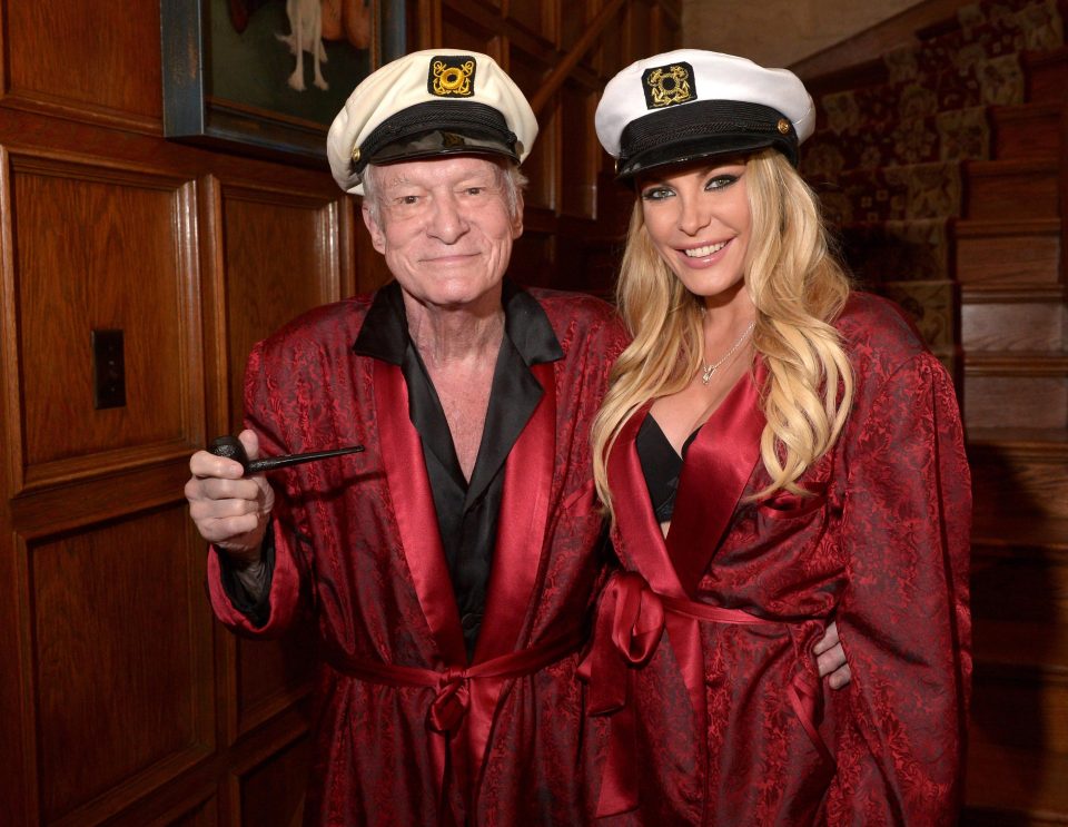  Hugh Hefner was laid to rest yesterday wearing his famous pyjamas, smoking jacket and cravat