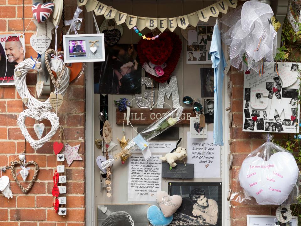  Fans have made a shrine to the late singer out side his home