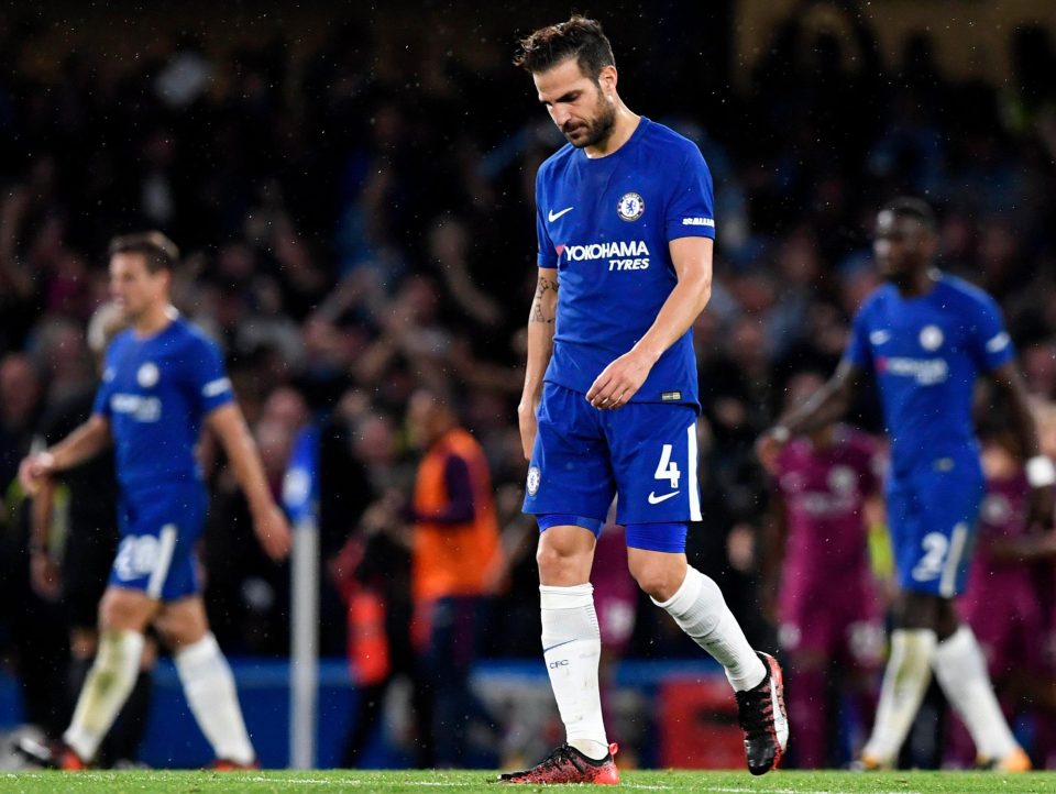  Tired Chelsea players trooped off after the home defeat