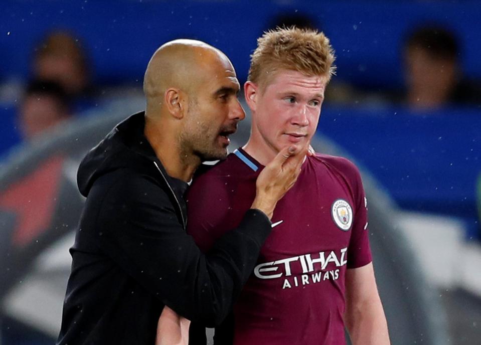  Pep Guardiola with Manchester City's match-winner Kevin De Bruyne at Stamford Bridge