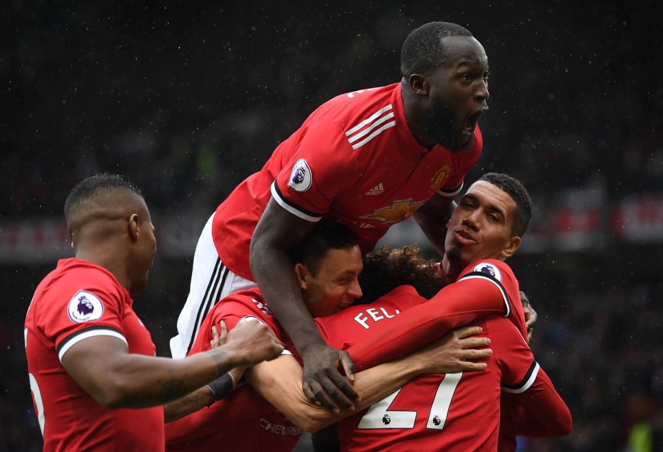 Romelu Lukaku celebrates United’s third goal with his team-mates