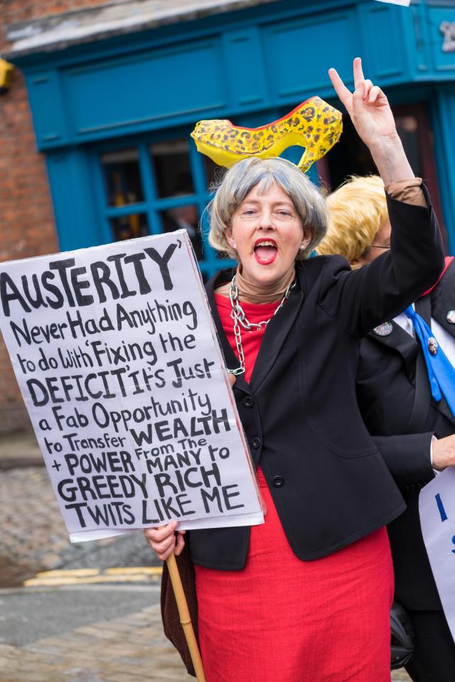  A protester dressed as Theresa May took part in the march