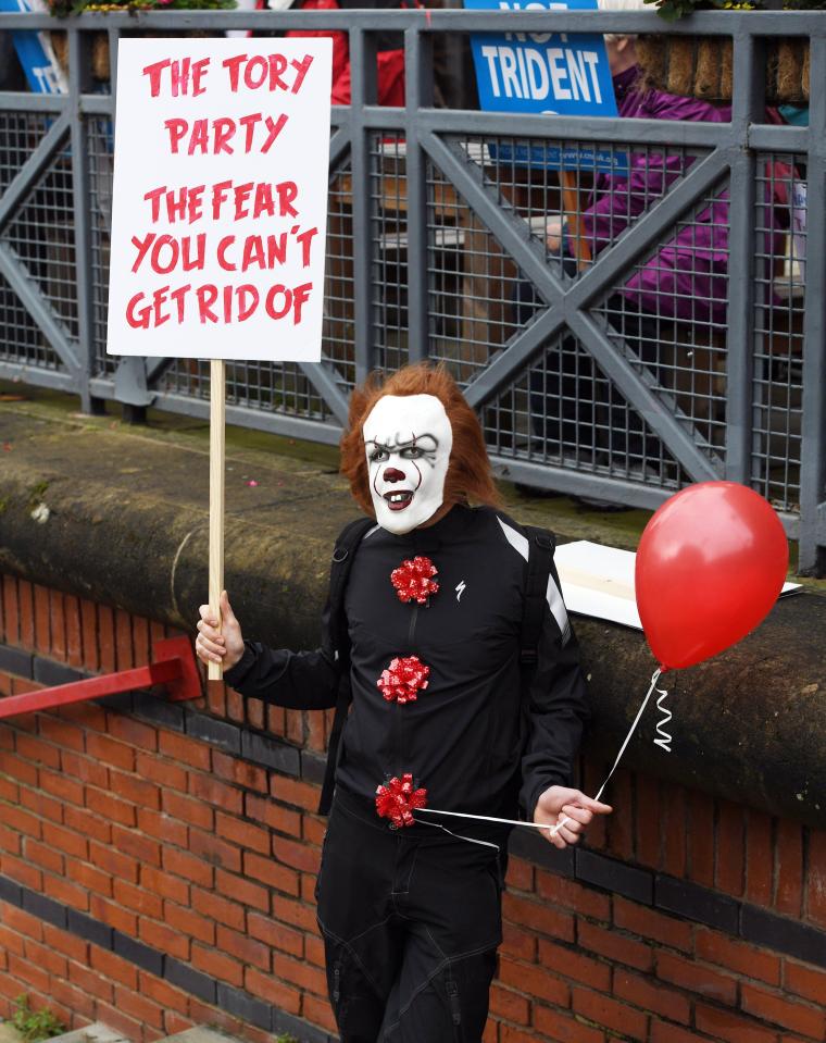  A protester dressed as Pennywise from the horror film IT took part in the demonstration