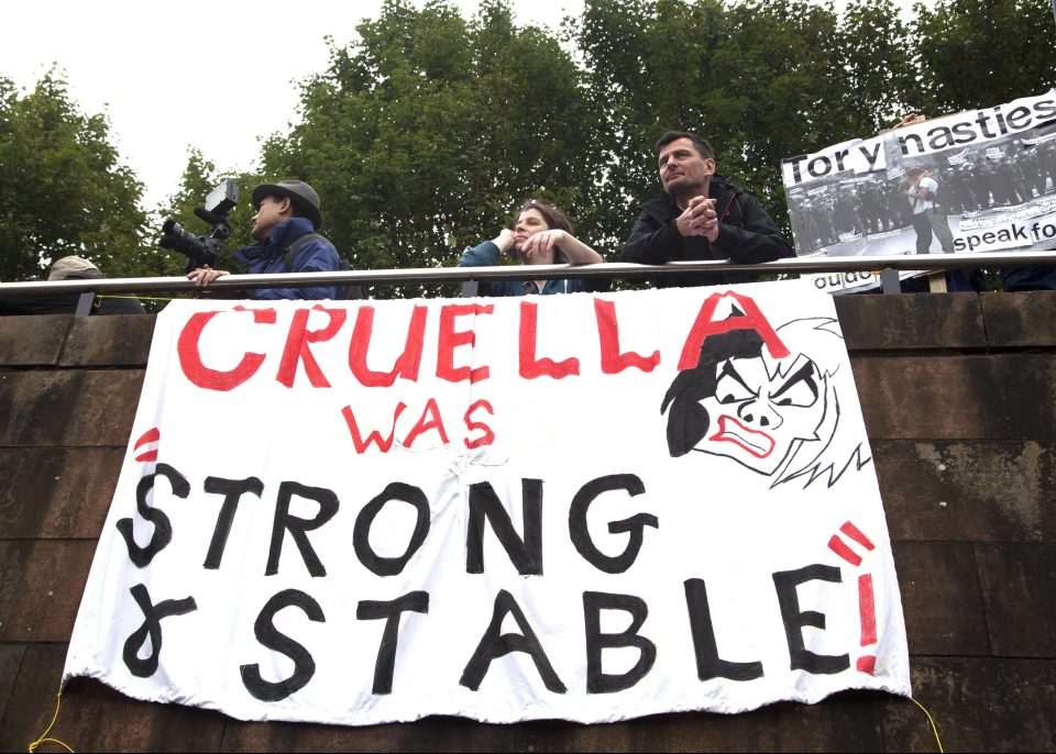  A banner comparing Theresa May to Cruella De Vil was flown during the march