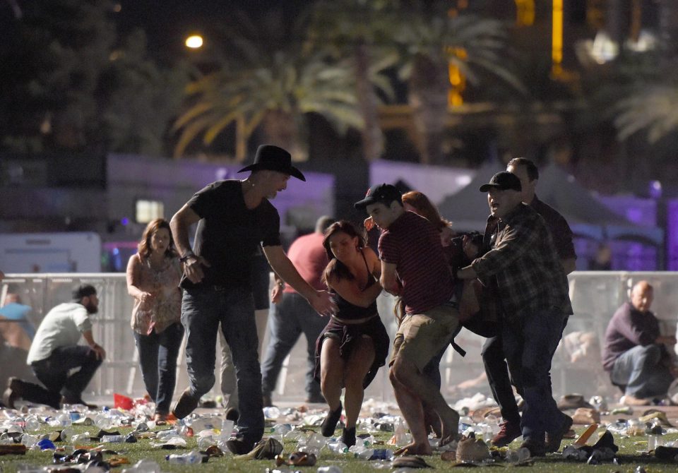  Hundreds of concert-goers fled the scene or ducked for cover amid heavy gunfire