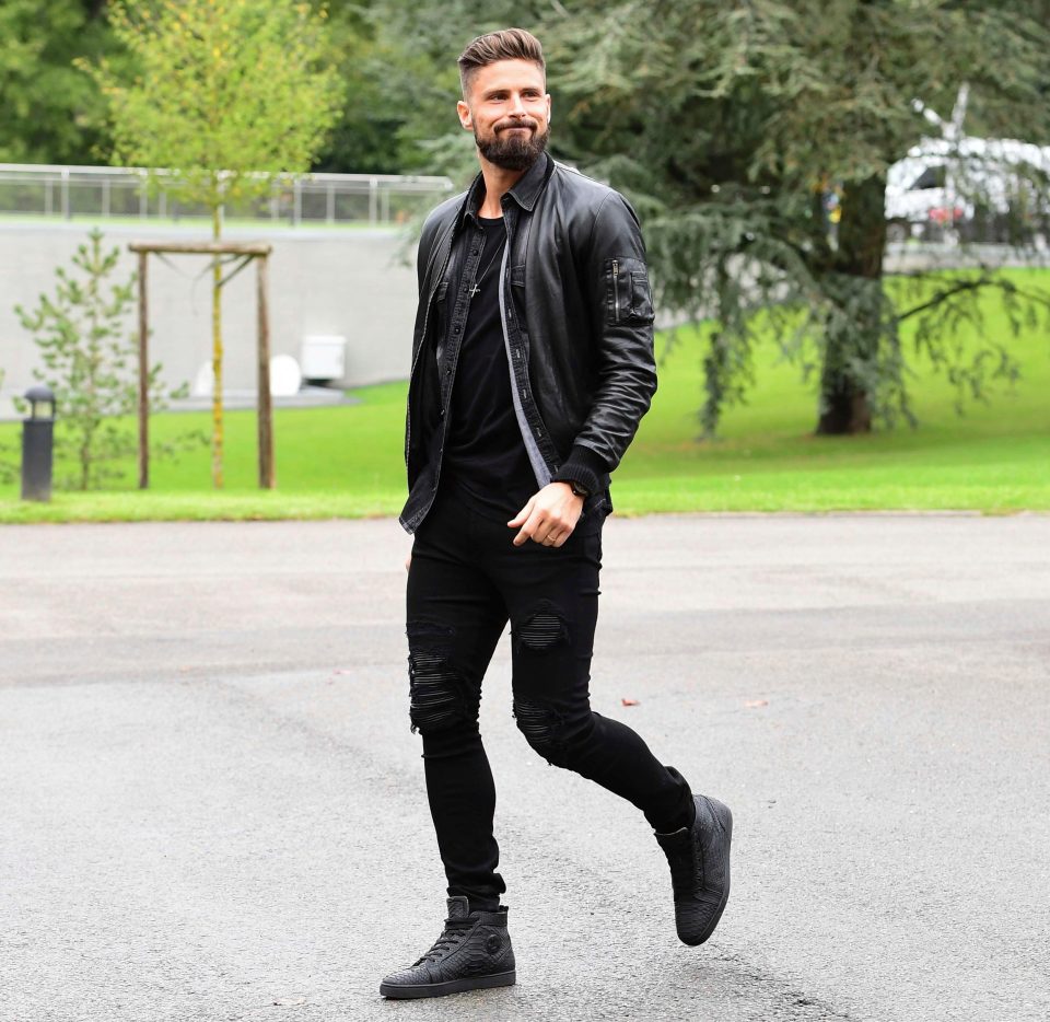  Giroud appears to be a French fashionista as he arrives for training with the national side