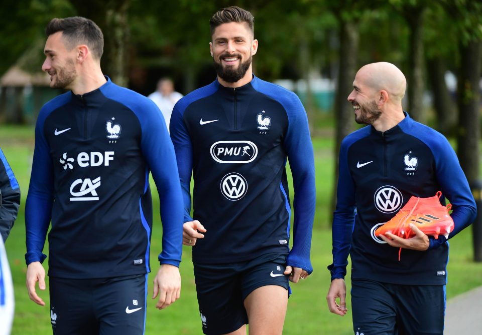  Hugo Lloris, Olivier Giroud and Christophe Jallet of France are all smiles ahead of their training session at the national football centre