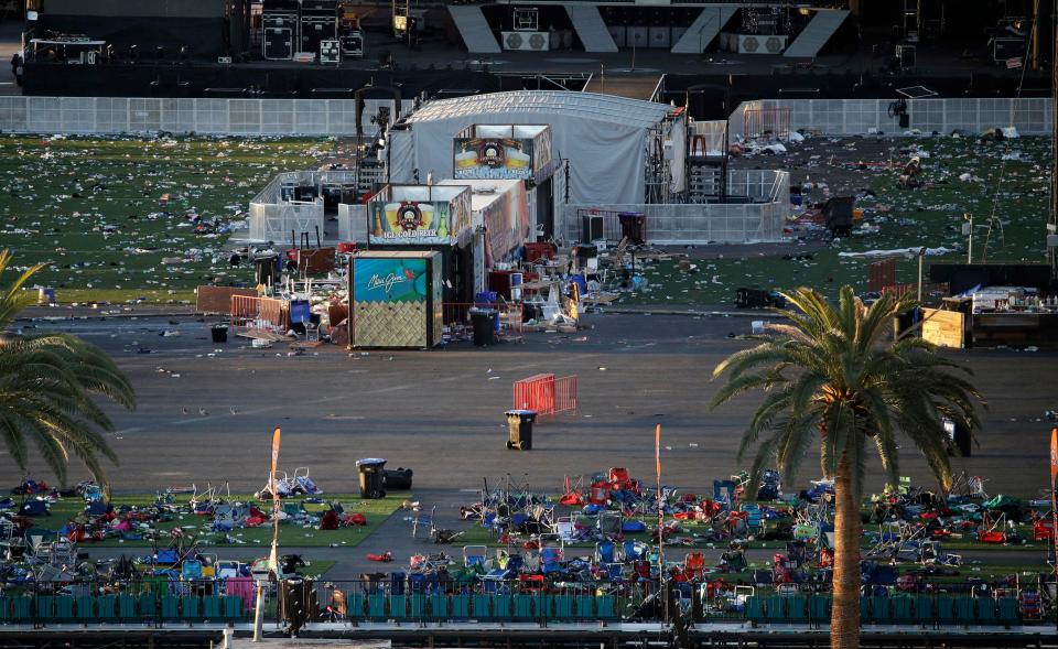  Debris litters a festival grounds across the street from the Mandalay Bay resort and casino in the aftermath of the shooting