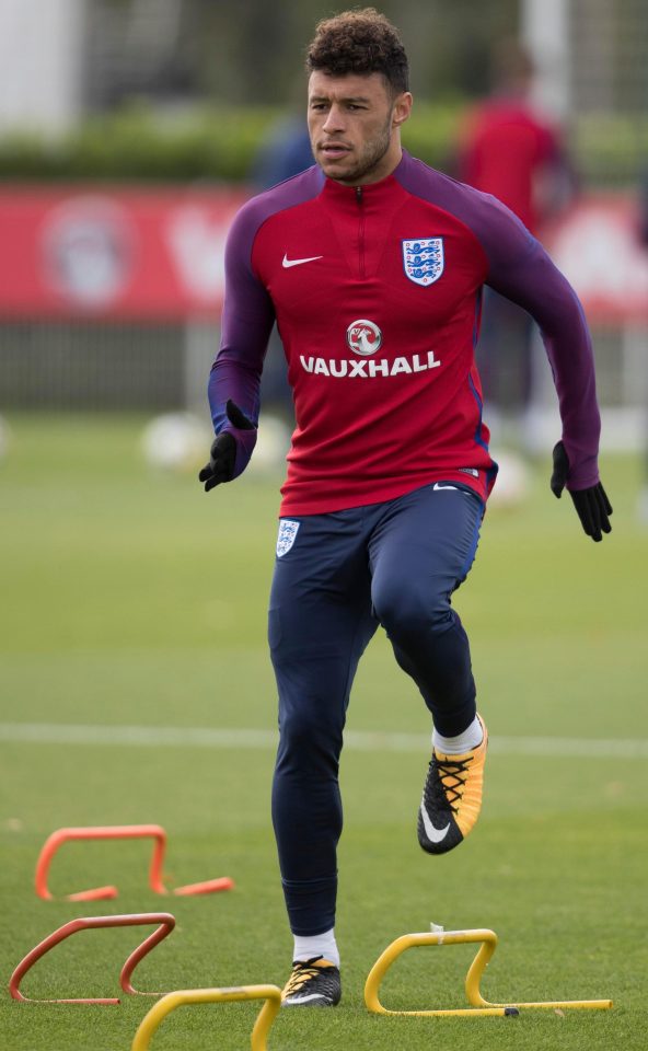  Alex Oxlade-Chamberlain jumps to it in England training