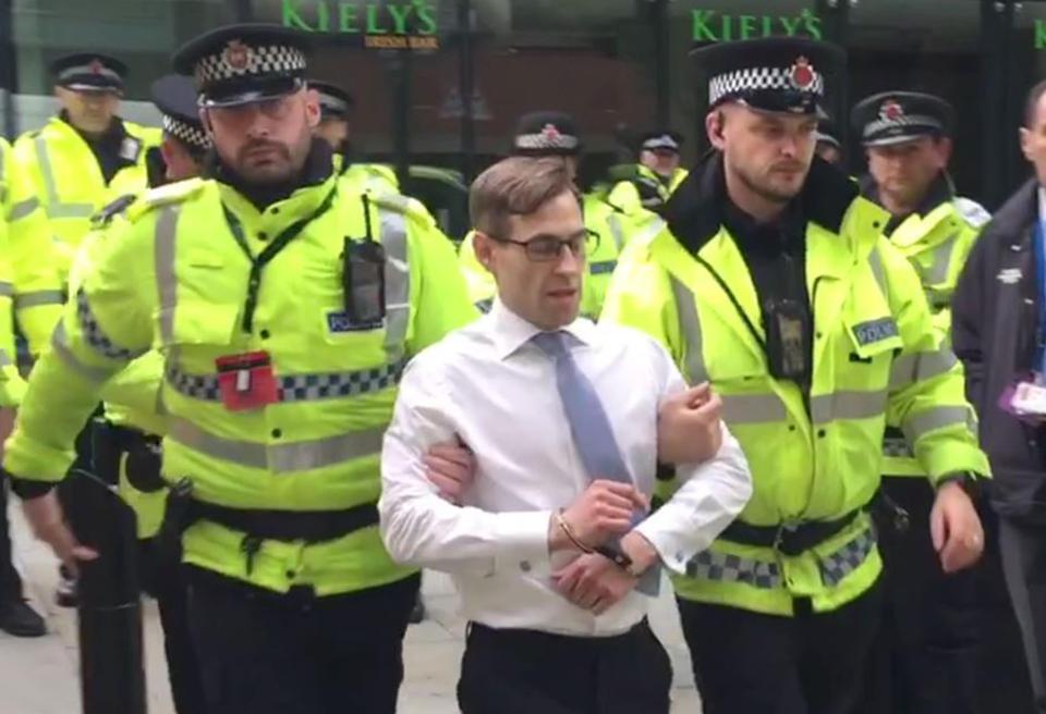  The prankster was taken away by police - but he was allowed to remain close to the PM for at least a minute