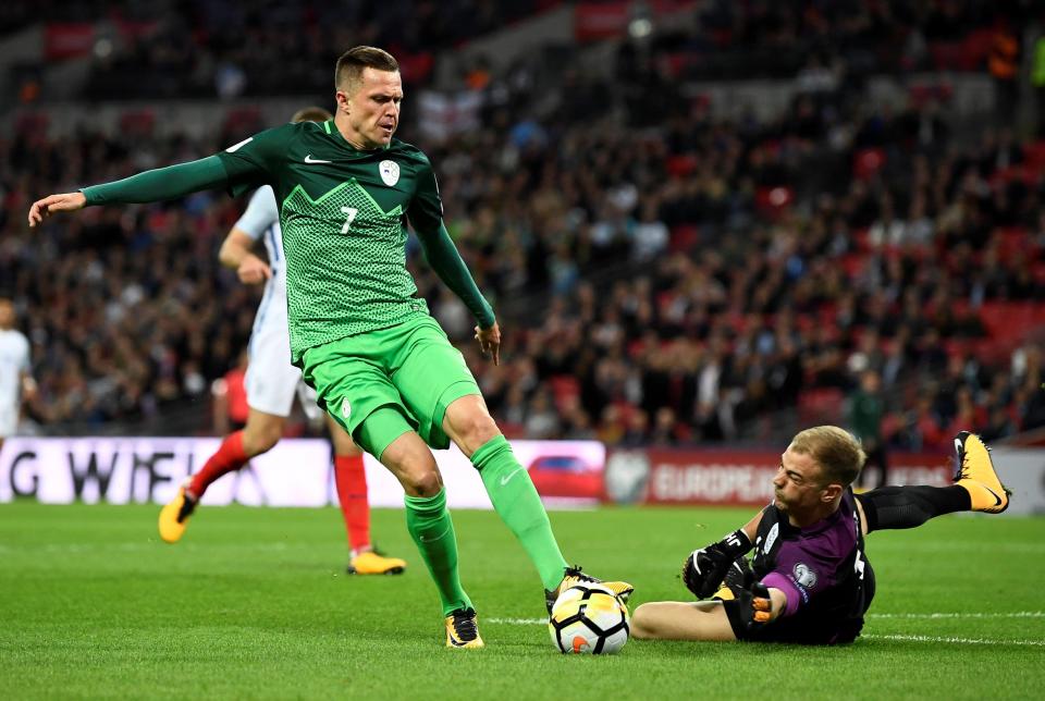 Joe Hart was lucky not to give away a penalty for this challenge on Slovenia’s Josip Ilicic