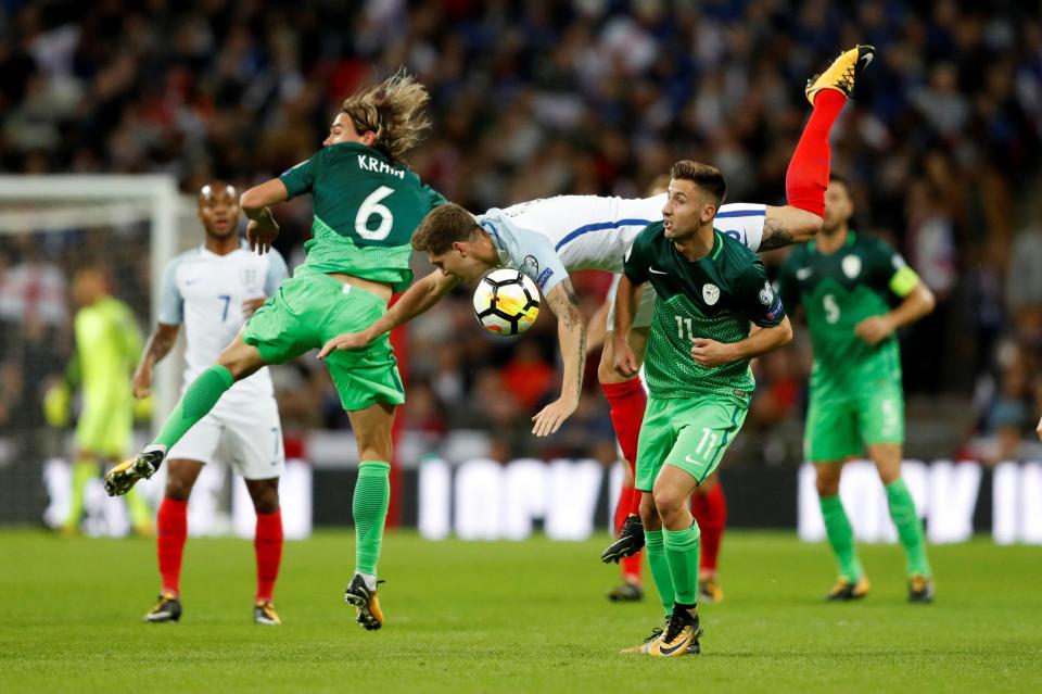  John Stones gets in a tangle with Rene Krhin and Andraz Sporar