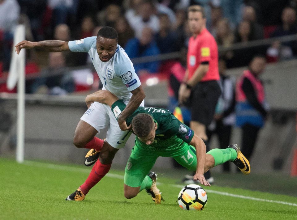 Raheem Sterling attempts to burst free in the first half at Wembley