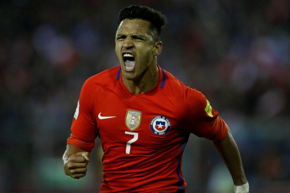  Alexis Sanchez roars after grabbing Chile's winner against Ecuador