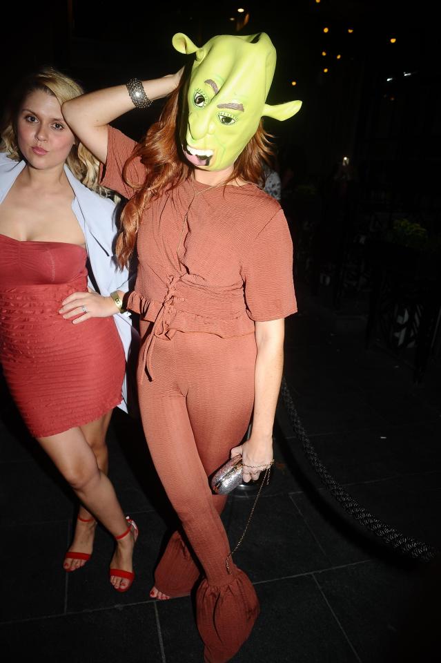  At one point Laura tried the mask on after her companion had taken it off