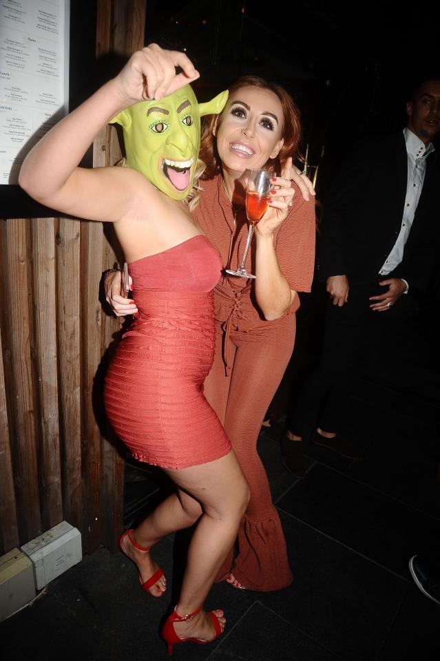  Simpson and her companion posed happily at a Manchester fashion bash