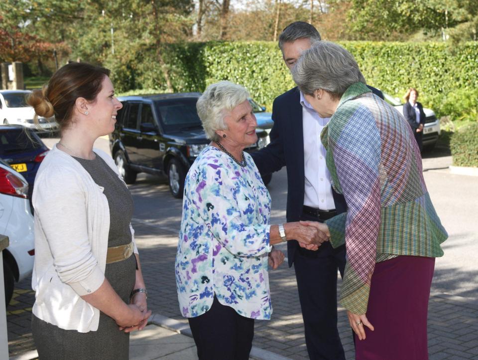  The PM spoke after she attended a charity coffee morning in her constituency