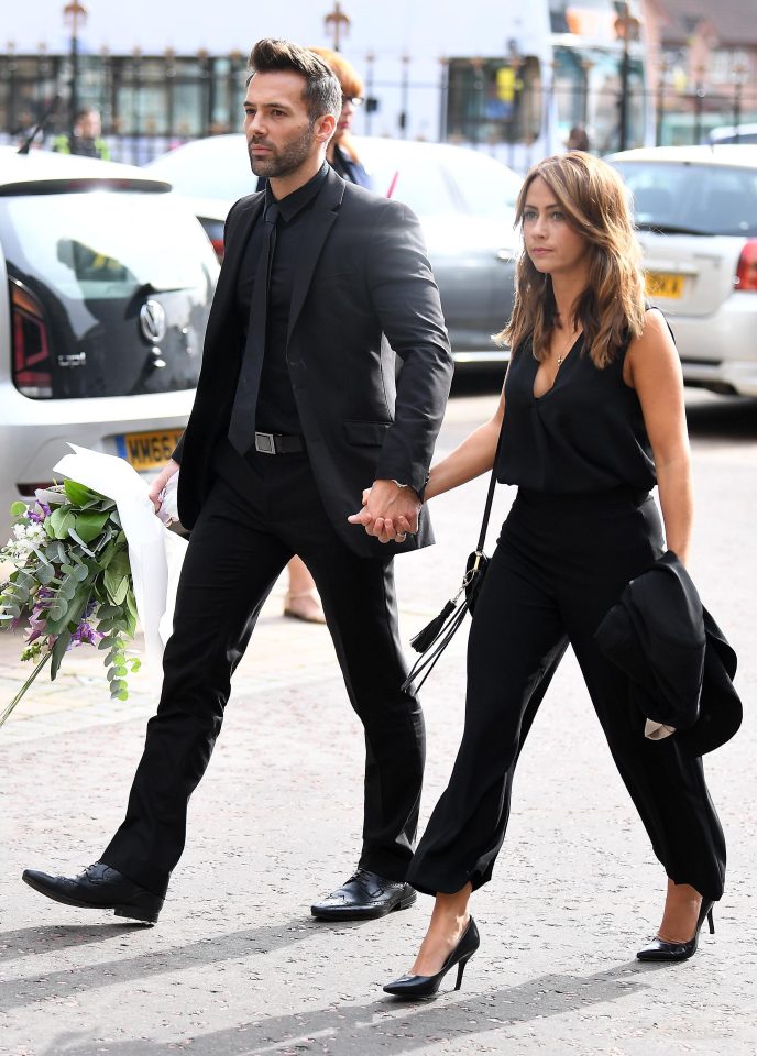  The couple looked sombre as they headed to the venue