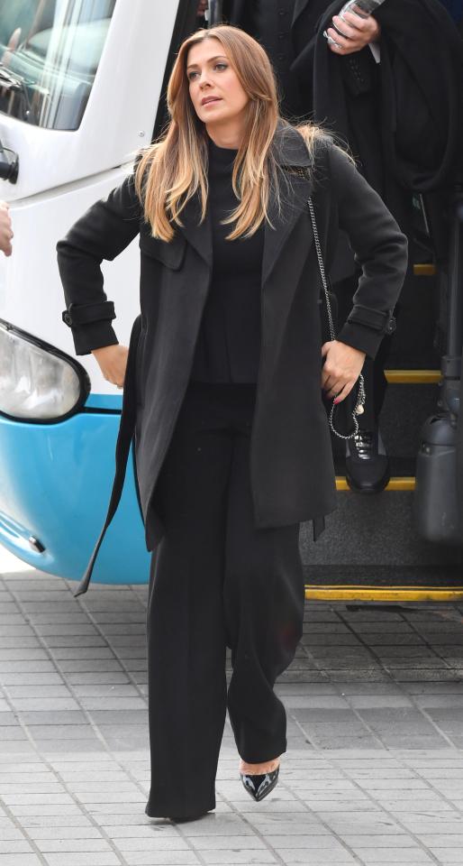  The actress looked stunning in a long black coat