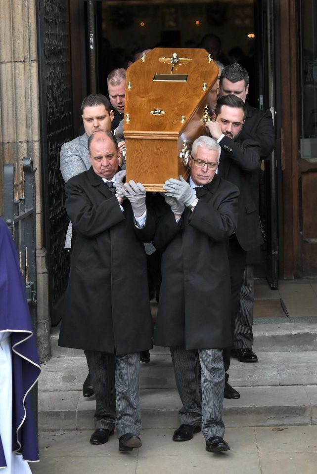  The coffin was carried out of the cathedral