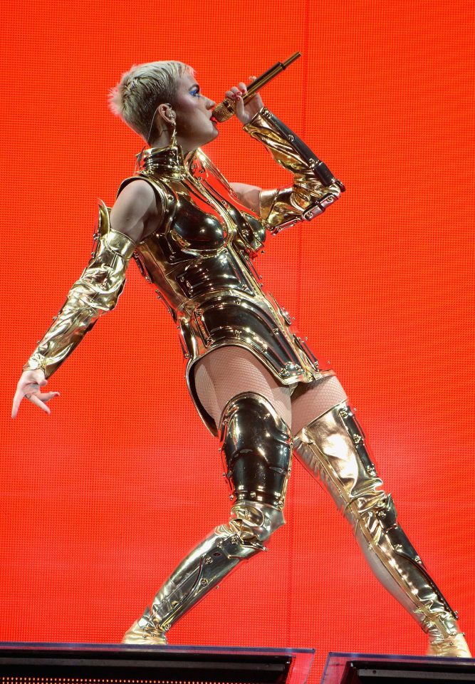  Katy Perry looks ready to do battle in this striking gold outfit